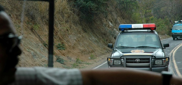 Police escort along the highway from Guatemala City to Coban. Photo by Daniel Bachhuber.
