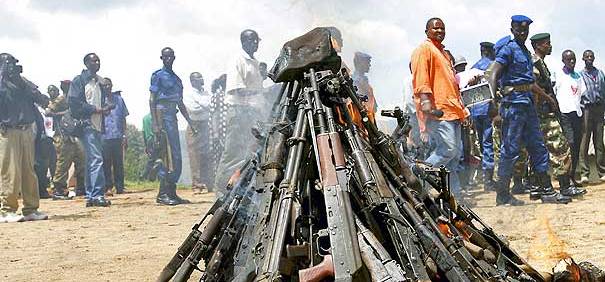 Weapons being burnt during the official launch of the Disarmament, Demobilization, Rehabilitation and Reintegration (DDRR) process in Muramvya, Burundi. Burundian military signed up voluntarily to be disarmed under the auspices of United Nations peacekee